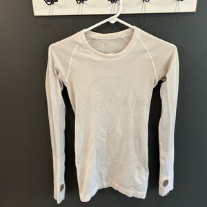 Lululemon white swiftly long sleeve size 2. ** READ**